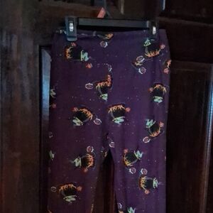 LuLaRoe Purple Space-Theme Leggings with Multicolor Rocket Print